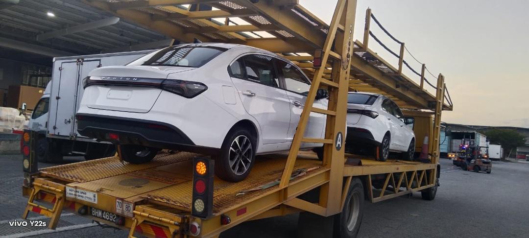 Proton vehicles loaded on a car carrier for export